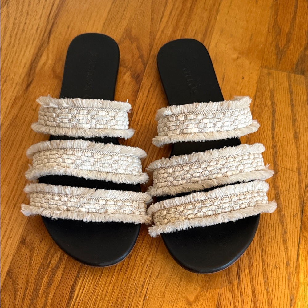 Rothy's Black and Cream Textured Sandals